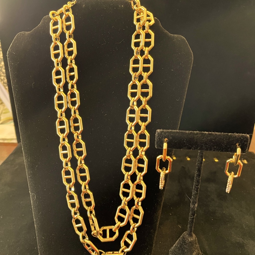 Linked gold tone, necklace, and earrings set.